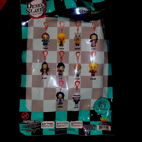 DEMON SLAYER GIYU TOMIOKA KEYCHAIN COLLECTIBLE - Picture 3 of 3